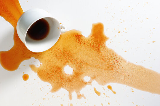 Spilled Coffee Cup on White