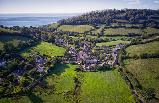 Drone view of the village of Branscombe and the coast beyond in Devon England UK