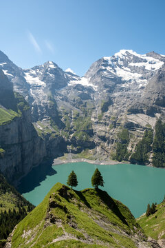 Discover stunning Oeschinensee in Kandersteg, Switzerland with breathtaking mountain views