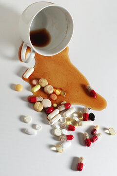 Spilled Coffee Cup and Pills