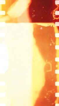 Abstract smoky cloud animation with vintage film grain and light leaks in dark background