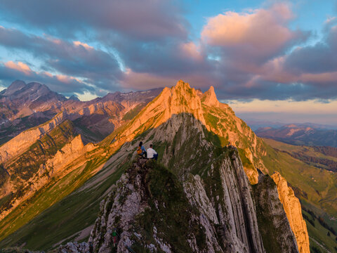 Experience the breathtaking beauty of Switzerland at the Ebenalp Schafler ridge during sunset.