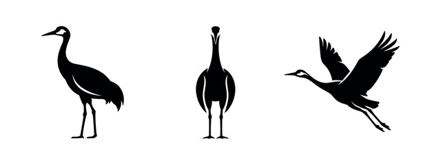 Obraz premium Crane Bird Silhouette Icons Set - Vector Illustrations of Cranes in Flight and Standing Poses