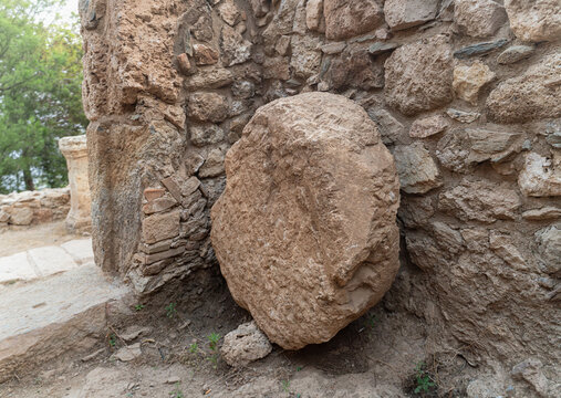Ancient Stone Ruins with Rolling Stone Door at Archaeological Site