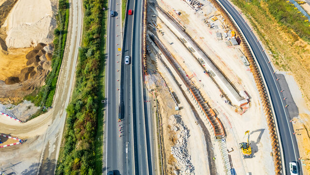 A top down drone Birds Eye view of the new underpass lanes being built on the new link road for the A11 and A47 at Thickthorn Interchange in Norwich, Norfolk, UK