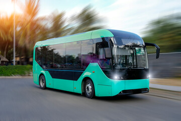 Turquoise color eco electric bus with bright headlights moving on the road in city © aapsky