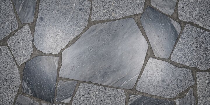 irregular grey flagstone paving texture. natural stone slab floor with cement grout lines. rustic outdoor patio design and architectural landscaping background.

