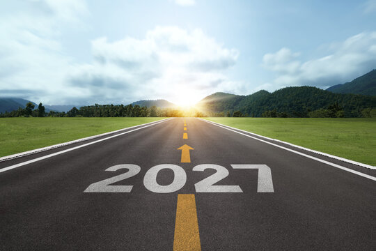 New year resolution 2027 concept. Word start 2027 on road at sunset. for challenge and beginning planning, Business target and growth strategy.