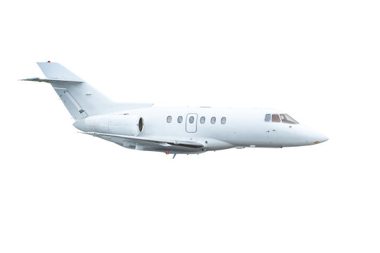 Modern white corporate jet plane flies isolated