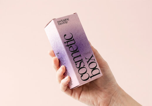 Hand Holding Cosmetic Box Mockup