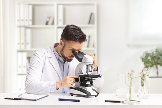 Doctor working with a microscope