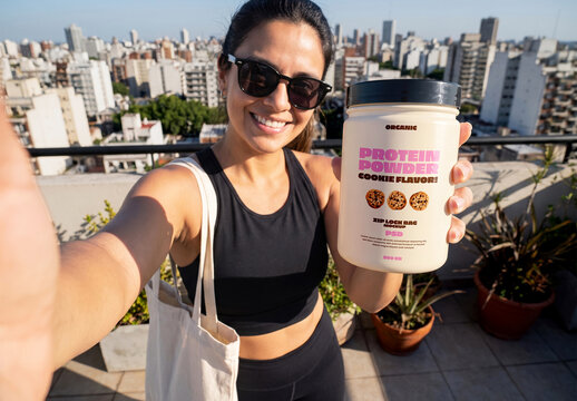 Woman Selfie with Protein Powder Jar on Rooftop Mockup