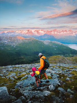 Family hiking mountains father and child travel explore Norway together active healthy lifestyle, parent and kid trekking on camping vacations tour outdoor holidays trip tourism recreation wanderlust