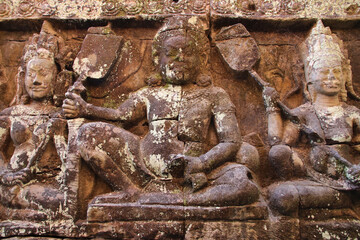Fototapeta premium sculpted terrace in a ruined khmer hindu and buddhist complex (angkor thom) in angkor in siem reap in cambodia 