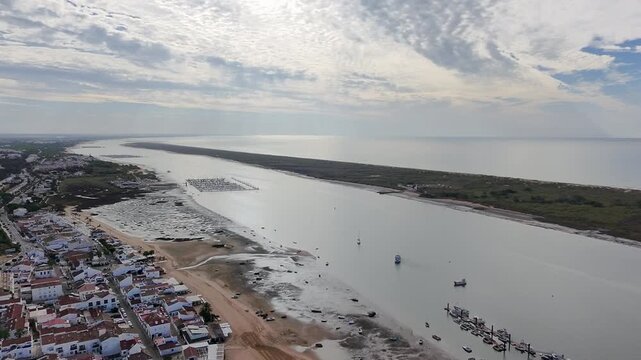 La Flecha de El Rompido. A natural area between the Piedras River and the Atlantic Ocean. Huelva. 4K drone video. travel concept