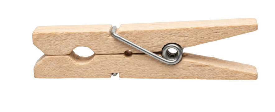 A single wooden clothespin isolated on a white background for laundry and craft project needs