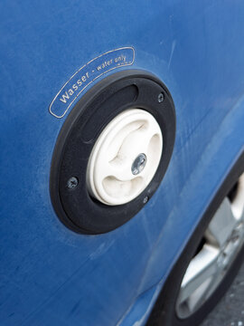 Water Fuel Fill Cap on a Blue Vehicle