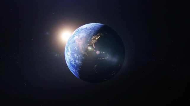Approaching planet earth from space. Mission and exploration. Earth zoom. 4k Cinematic animated background. Sunrise with light reflection effects in the globe middle.