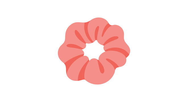 Coral scrunchie with gathered fabric on a plain white background
