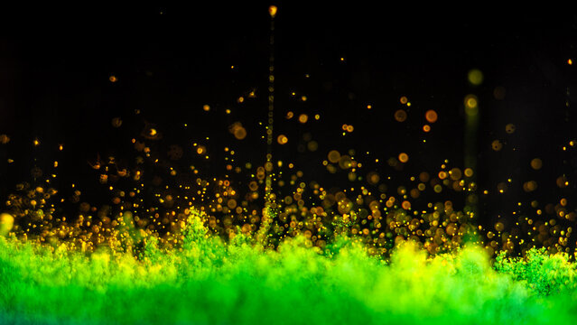 Emerald Green and Gold Particles Explosion