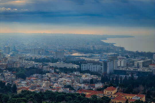 Panoramic View of Thessaloniki Waterfront and City Center Under Dramatic Storm Clouds