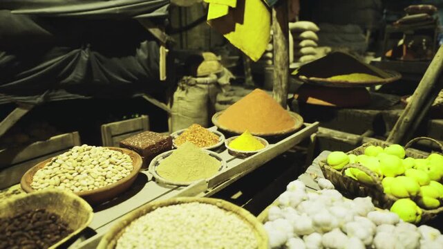 Bulk grains and loose produce displayed zero waste style stall with refill sacks, grains and spices offered loose in baskets, ecoconscious vendor encouraging