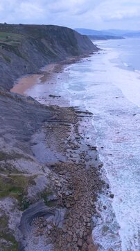 Aerial view from a drone of the Flysch of Bizkaia on the Cantabrian Sea coast between Algorta and Bakio. Province of Bizkaia. Basque Country. Spain. Europe.