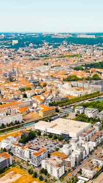 Vertical video. Nancy, France. Panorama of the central part of the city. Summer, Sunny day. Drone footage. Rich colors