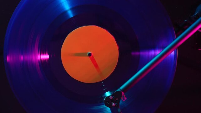 Close-up of a vinyl record playing on a turntable