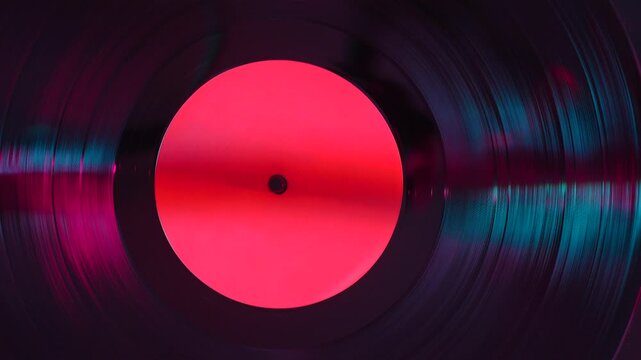 Close-up of a vinyl record spinning on a turntable
