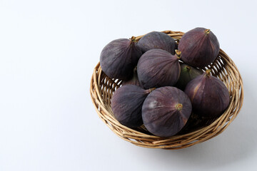 Fresh autumn figs on a colored background.  © Pixora ST 