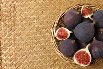 Fresh autumn figs on a colored background.  © Pixora ST 