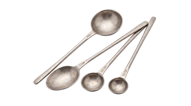Vintage metal measuring spoons set, antique silver cooking utensils, rustic kitchen tools for baking prep isolated PNG with Transparent Background