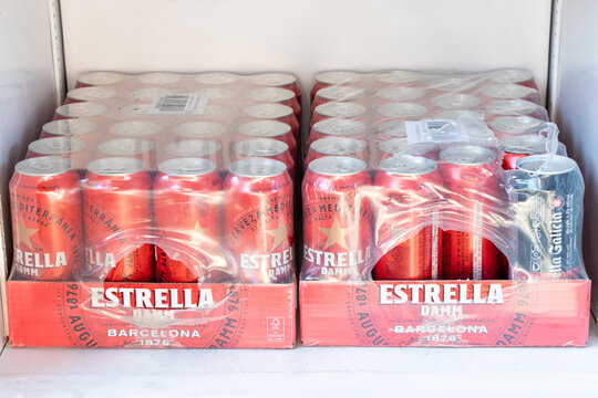 Ukraine, Dnipro, September 19, 2026 multipack of Estrella Damm beer cans in a refrigerator. Alcoholic beverages in multipacks