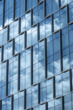 Reflective glass windows on modern corporate office building