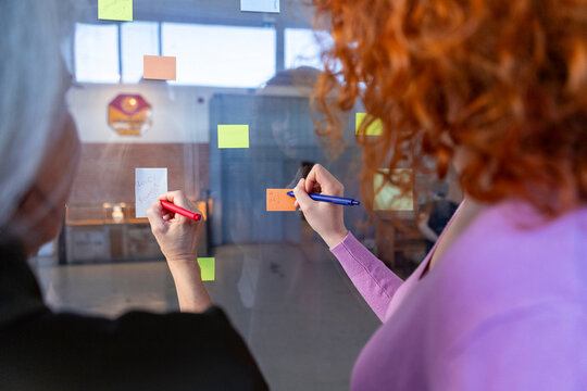 Two generations plan ideas on office glass wall