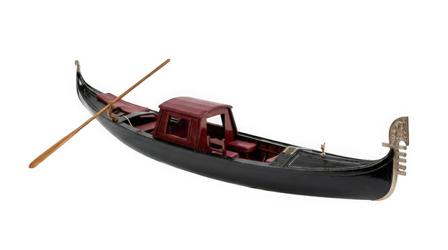 Miniature model of a traditional venetian gondola with a wooden oar isolated on transparent background