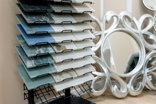 Ceramic tile samples displayed beside decorative mirrors
