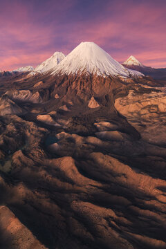 Parinacota Volcano above volcanic wetlands at sunset
