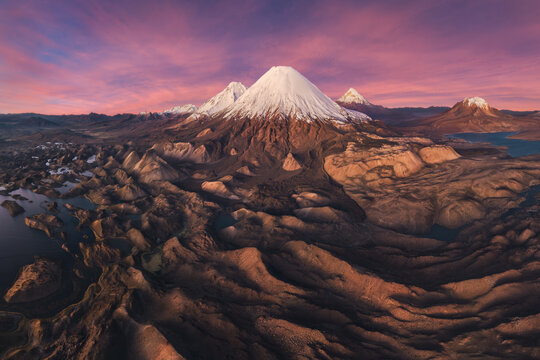 Parinacota Volcano above Lauca National Park wetlands at sunset
