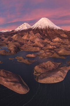 Parinacota Volcano above Lauca National Park wetlands at dusk