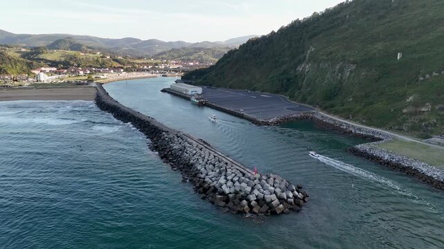Scenic aerial view of the Oria river flowing into the ocean in Spain