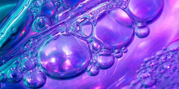 Macro view of iridescent liquid bubble science background