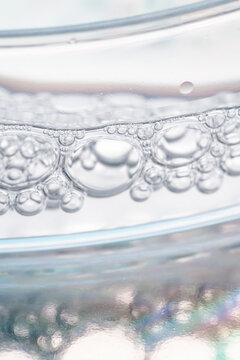 Macro view of oxygen bubbles in clear water