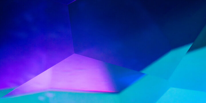 Abstract blue and purple geometric tech background