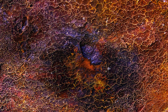Colorful oxidized surface texture with intricate natural patterns