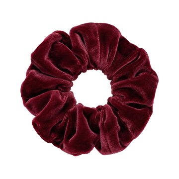 Single elegant dark red velvet scrunchie, a soft and luxurious hair accessory, is displayed on a clean white background