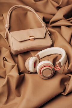 Brown headphones and handbag on mocha mousse leather