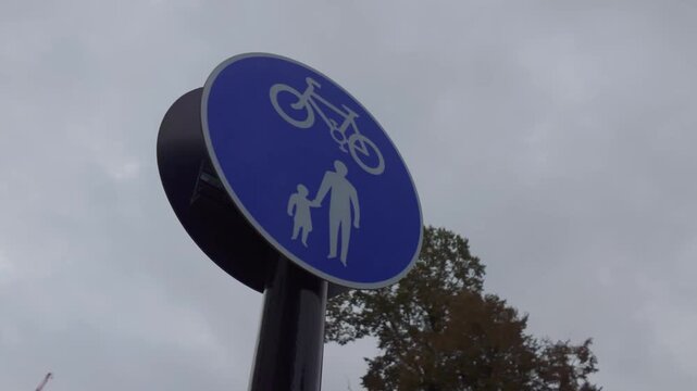 Cutaway 50fps. Bicycle sign, bike route, british road sign. 