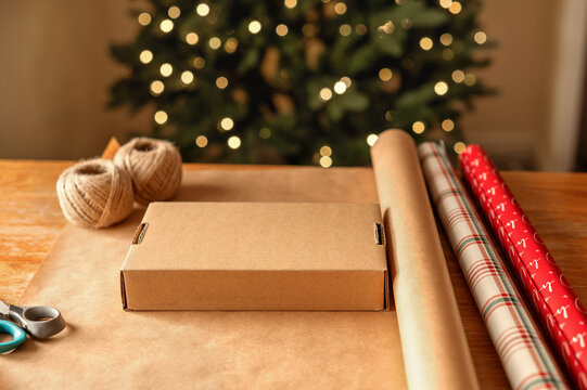 Kraft paper gift box with twine and Christmas wrapping
